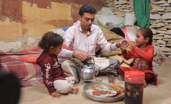 Waleed Al- Ahdal, a simple man who lives in Aljufainah IDPs camp, is preparing the Iftar for him and his kids to break the fasting in Ramadan.